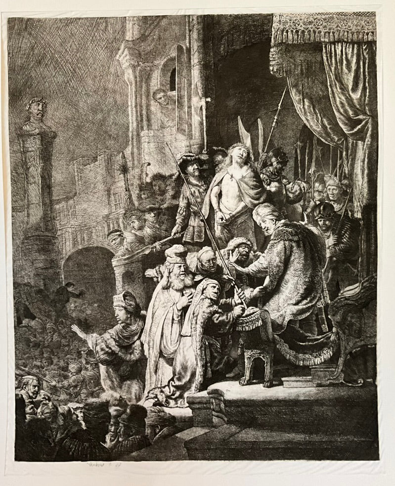 A tissue etching of 'Christ Before Pilate' with a cardboard frame, featuring a scene with multiple figures, likely representing a biblical or historical narrative.
