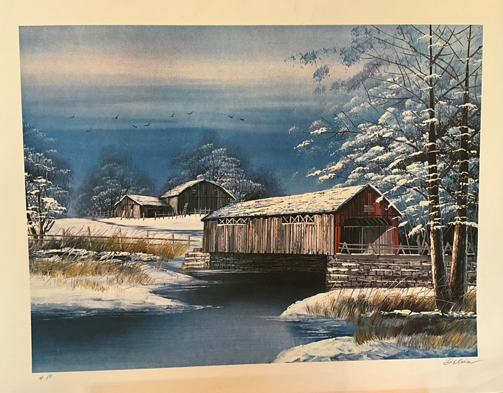 Winter landscape painting featuring a covered wooden bridge over a frozen stream, snow-covered trees, and rustic barns in the background.