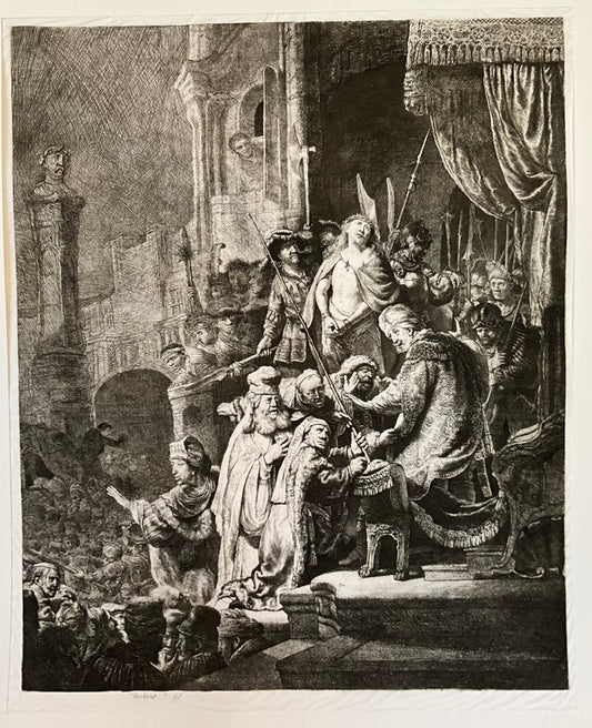 A tissue etching of 'Christ Before Pilate' with a cardboard frame, featuring a scene with multiple figures, likely representing a biblical or historical narrative.