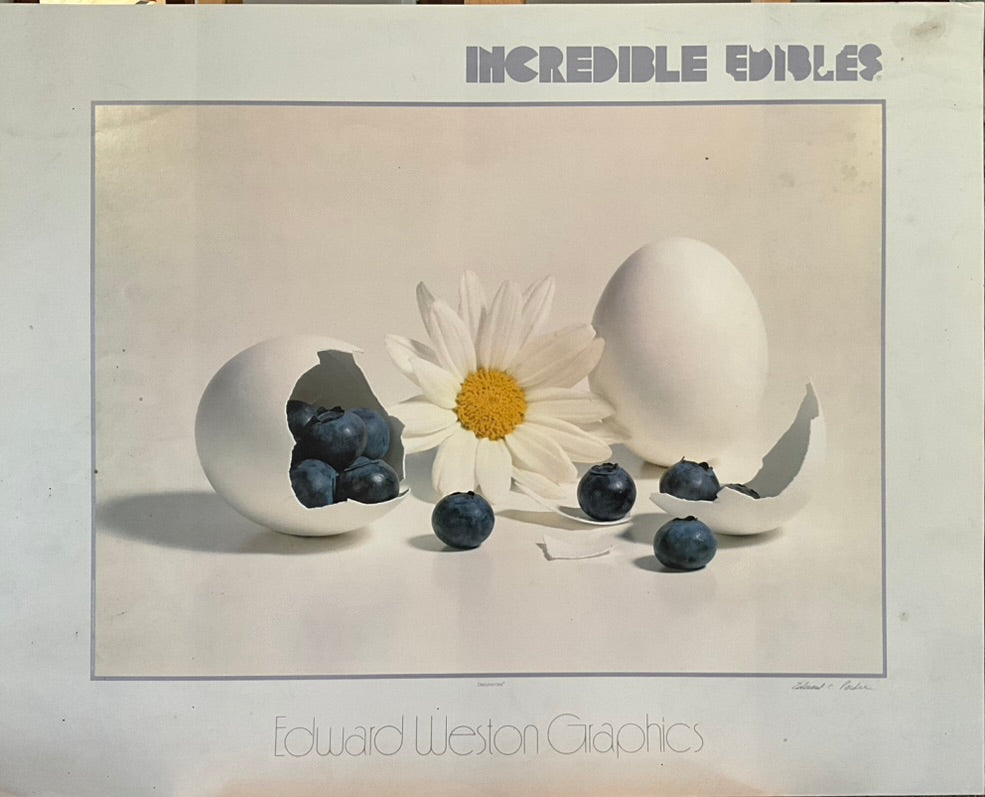 A poster featuring a still life arrangement of blueberries, an egg, and a daisy with the text 'Incredible Edibles' and 'Edward Weston Graphics' on it.