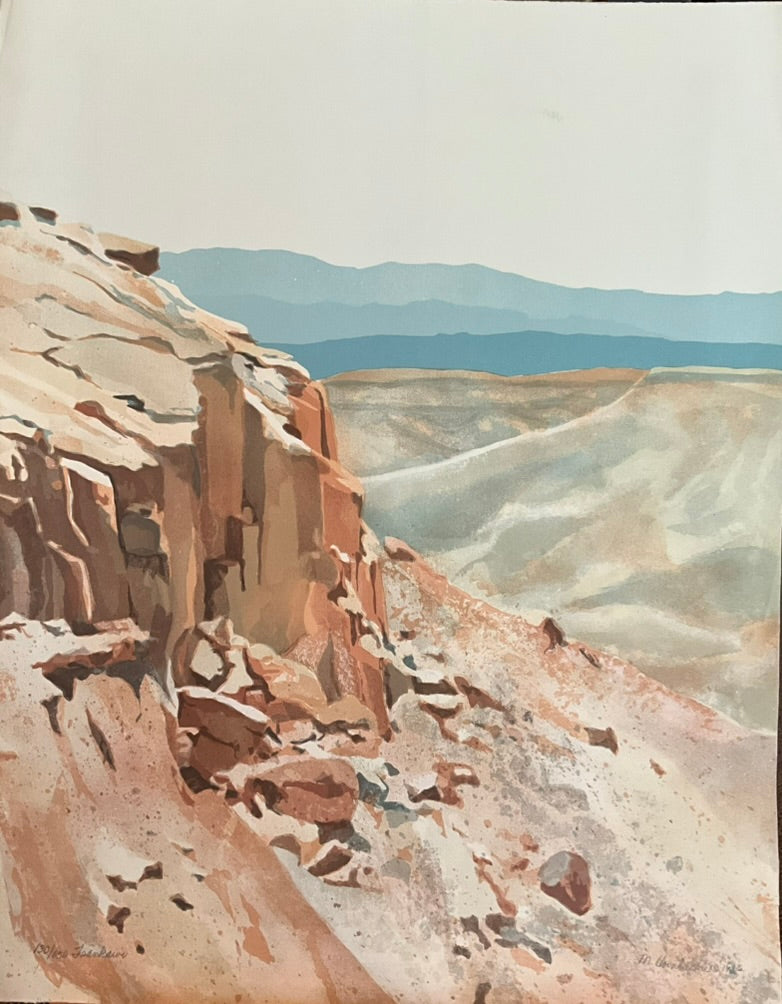 Unframed artwork depicting a scenic view of a canyon with mountains in the background.